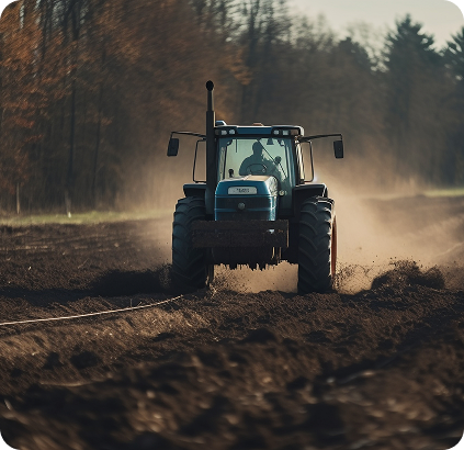Tractor working in field